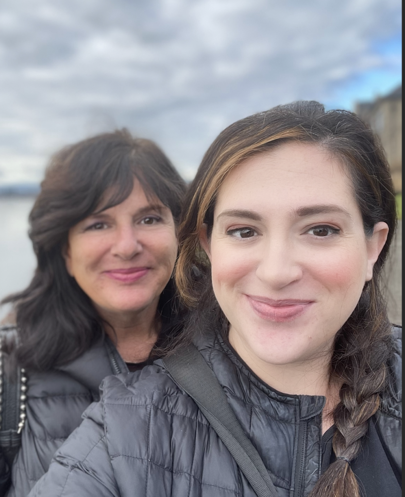 Ilana Jacqueline and her mom, Carri Levy, smiling together outdoors